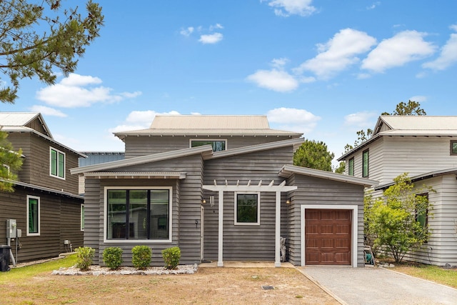 view of front of house featuring a garage and driveway