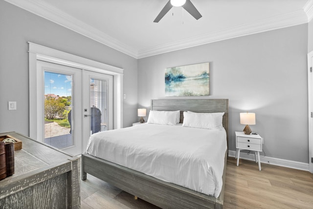 4724 Rendezvous Cv, Destin, FL 32541 - bedroom with crown molding, access to outside, french doors, wood finished floors, and a ceiling fan