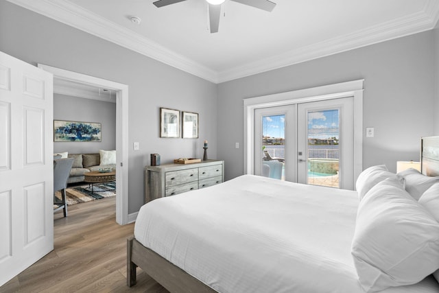 4724 Rendezvous Cv, Destin, FL 32541 - bedroom with french doors, access to outside, ornamental molding, light wood-style floors, and a ceiling fan