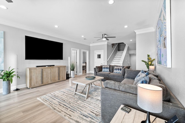 4724 Rendezvous Cv, Destin, FL 32541 - living area featuring a ceiling fan, crown molding, recessed lighting, stairs, and light wood-style flooring
