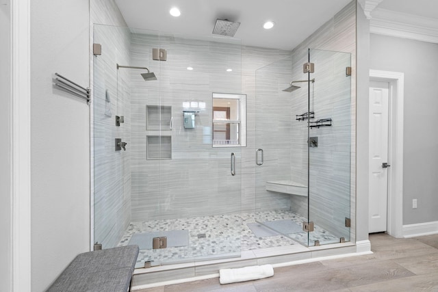 4724 Rendezvous Cv, Destin, FL 32541 - full bathroom featuring a shower stall, baseboards, wood finished floors, recessed lighting, and ornamental molding