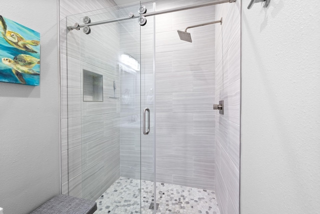 4724 Rendezvous Cv, Destin, FL 32541 - bathroom featuring a shower stall
