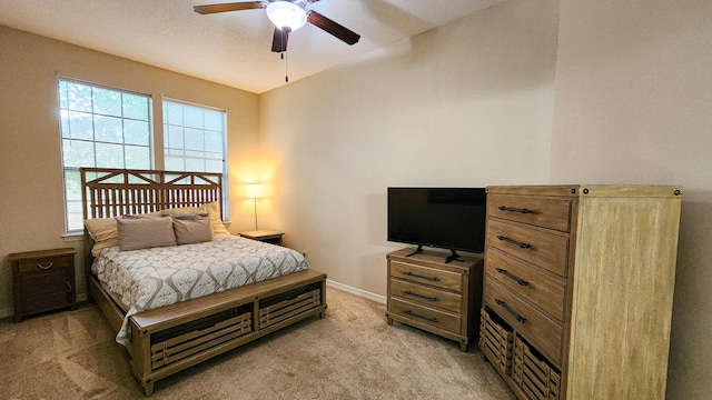 1100 Crosswinds Lndg Unit 21, Fort Walton Beach, FL 32547 - bedroom featuring light colored carpet, baseboards, and ceiling fan