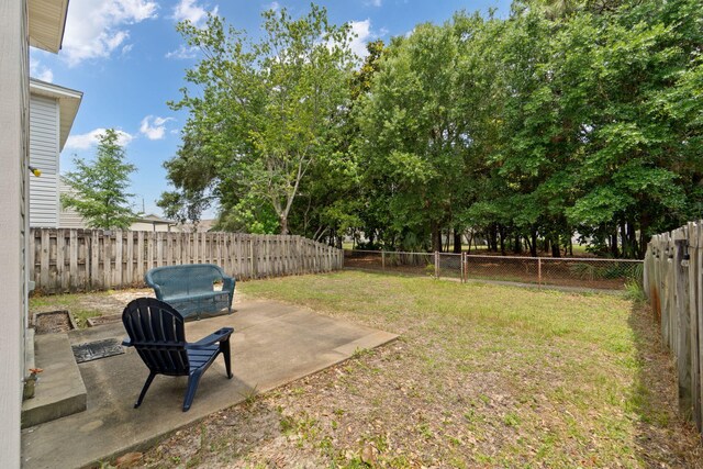 9 5th Ave, Shalimar, FL 32579 - view of yard with a patio area