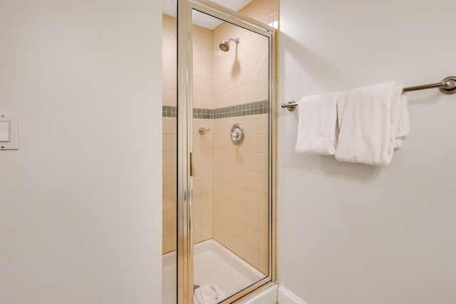 bathroom with a stall shower