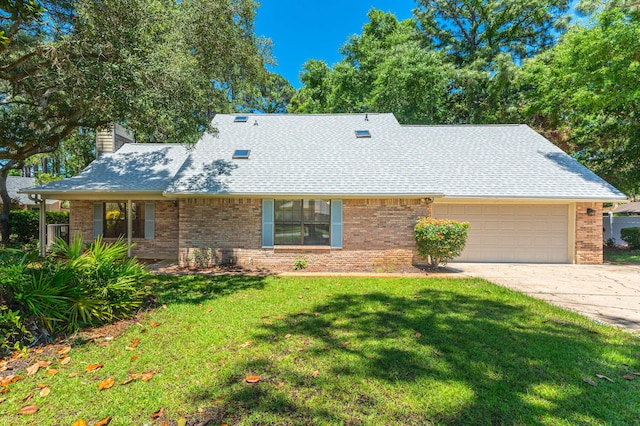 829 S Turnberry Cv, Niceville, FL 32578 - view of front of property featuring an attached garage, roof with shingles, a chimney, and brick siding