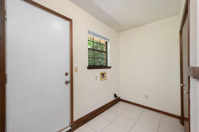 829 S Turnberry Cv, Niceville, FL 32578 - washroom with hookup for a washing machine, baseboards, and light tile patterned flooring