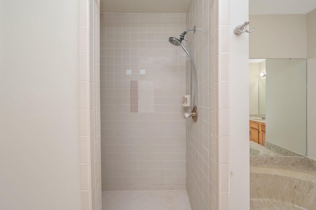 829 S Turnberry Cv, Niceville, FL 32578 - full bathroom featuring a tile shower and vanity