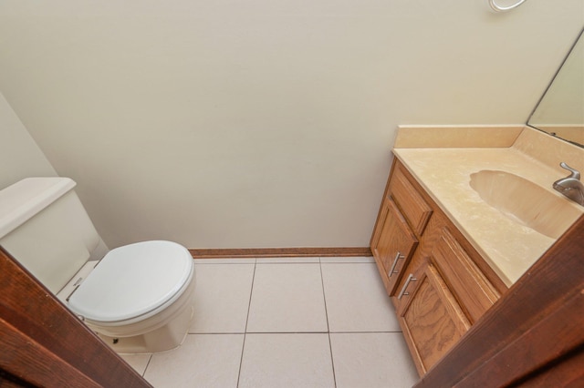 829 S Turnberry Cv, Niceville, FL 32578 - half bath featuring tile patterned flooring, toilet, vanity, and baseboards