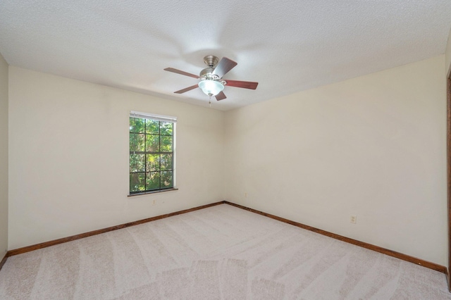 829 S Turnberry Cv, Niceville, FL 32578 - empty room with ceiling fan, light carpet, baseboards, and a textured ceiling