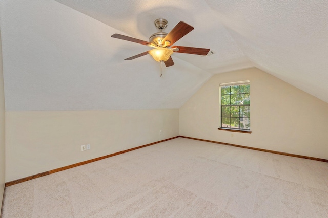 829 S Turnberry Cv, Niceville, FL 32578 - additional living space featuring carpet floors, lofted ceiling, baseboards, and ceiling fan