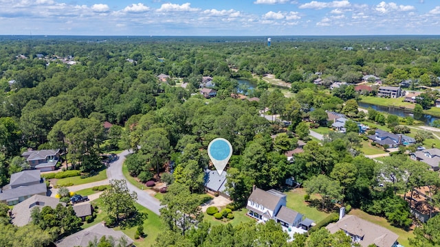 829 S Turnberry Cv, Niceville, FL 32578 - aerial view of property and surrounding area with a heavily wooded area, nearby suburban area, and a large body of water