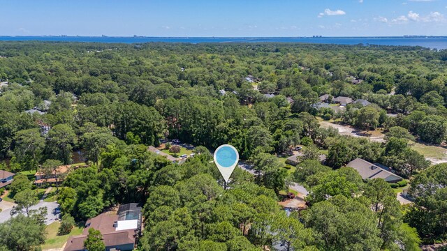 829 S Turnberry Cv, Niceville, FL 32578 - aerial view of property's location with a heavily wooded area and a nearby body of water