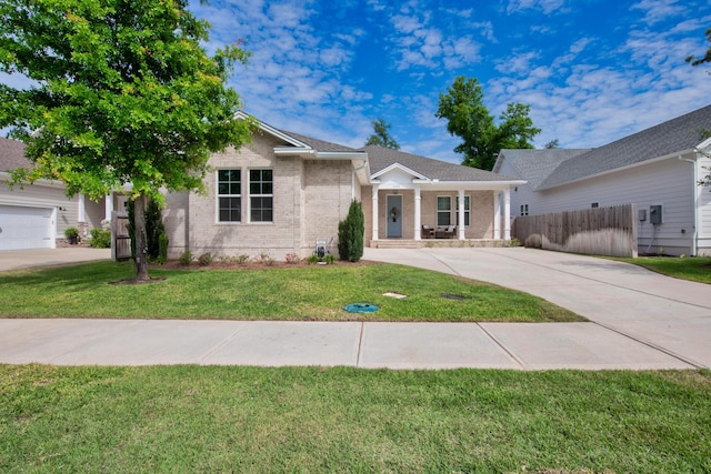 1233 Elderflower Dr, Niceville, FL 32578 - ranch-style home with driveway, brick siding, and a porch