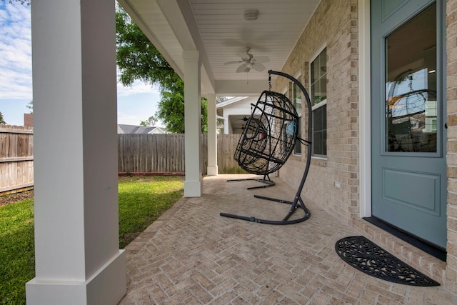 1233 Elderflower Dr, Niceville, FL 32578 - view of patio featuring ceiling fan and fence