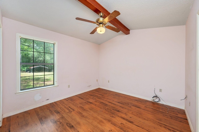 empty room featuring wood finished floors, ceiling fan, and baseboards