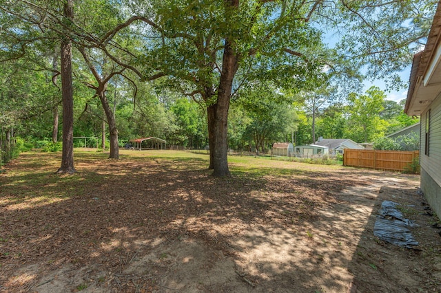 view of yard featuring fence