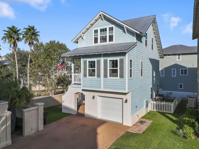 9 Inlet Heights Ln, Inlet Beach, FL 32461 - beach home with decorative driveway, a garage, central AC unit, and metal roof