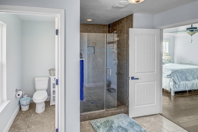 9 Inlet Heights Ln, Inlet Beach, FL 32461 - full bath with ensuite bath, a stall shower, toilet, a ceiling fan, and baseboards
