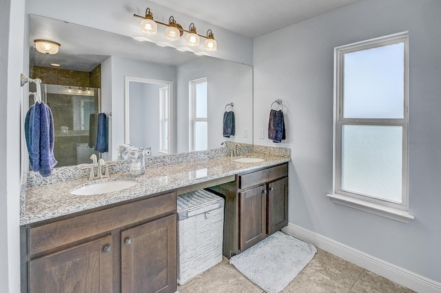 9 Inlet Heights Ln, Inlet Beach, FL 32461 - bathroom featuring plenty of natural light, baseboards, a shower stall, and double vanity