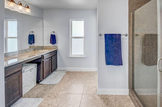 9 Inlet Heights Ln, Inlet Beach, FL 32461 - bathroom with a shower stall, baseboards, vanity, and tile patterned floors
