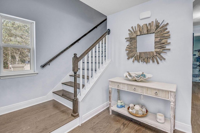 9 Inlet Heights Ln, Inlet Beach, FL 32461 - stairs with wood finished floors and baseboards