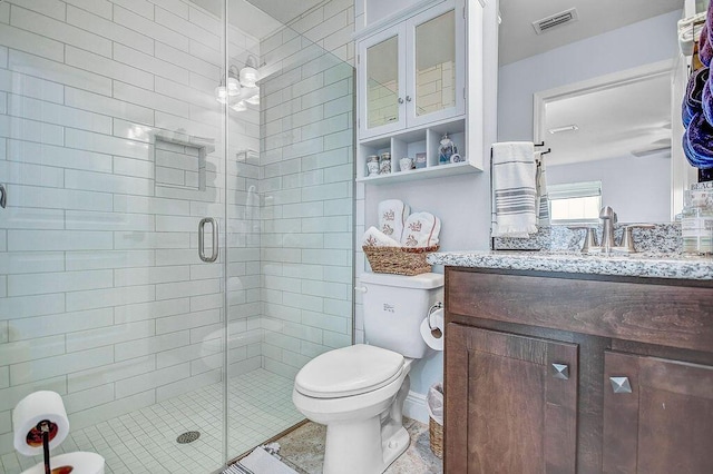 9 Inlet Heights Ln, Inlet Beach, FL 32461 - full bathroom with a stall shower, toilet, and vanity