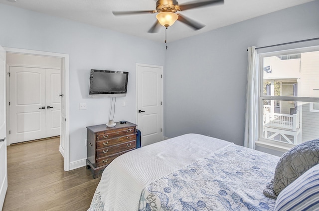 9 Inlet Heights Ln, Inlet Beach, FL 32461 - bedroom featuring wood finished floors, baseboards, and a ceiling fan