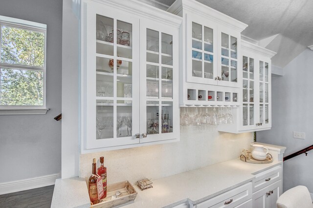 9 Inlet Heights Ln, Inlet Beach, FL 32461 - indoor dry bar featuring baseboards and dark wood-type flooring
