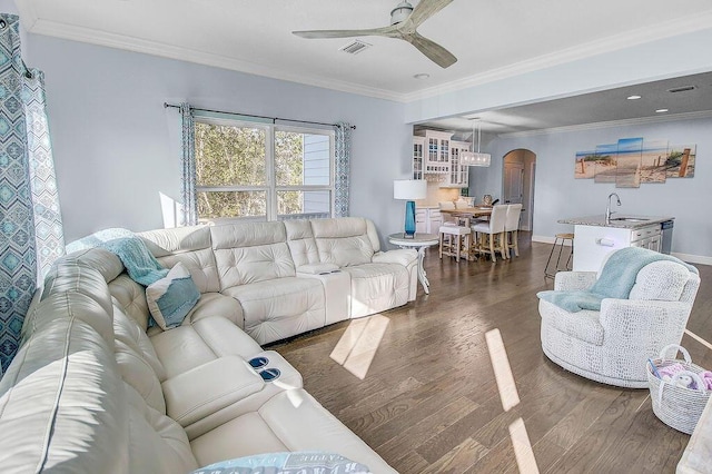 9 Inlet Heights Ln, Inlet Beach, FL 32461 - living room featuring arched walkways, a ceiling fan, dark wood-type flooring, and ornamental molding