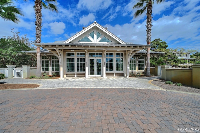 9 Inlet Heights Ln, Inlet Beach, FL 32461 - rear view of property featuring a gate, a patio, fence, and stucco siding