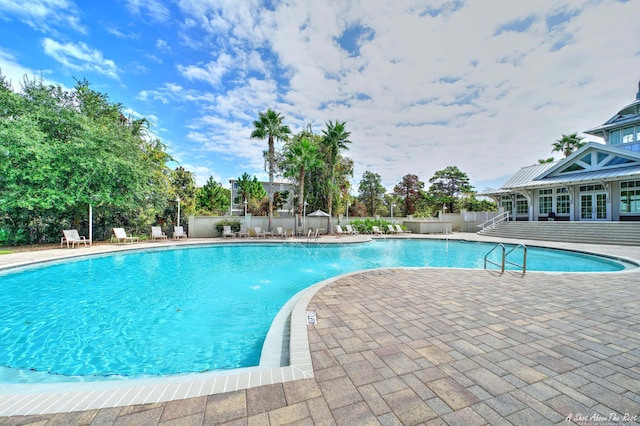 9 Inlet Heights Ln, Inlet Beach, FL 32461 - community pool featuring a patio and fence