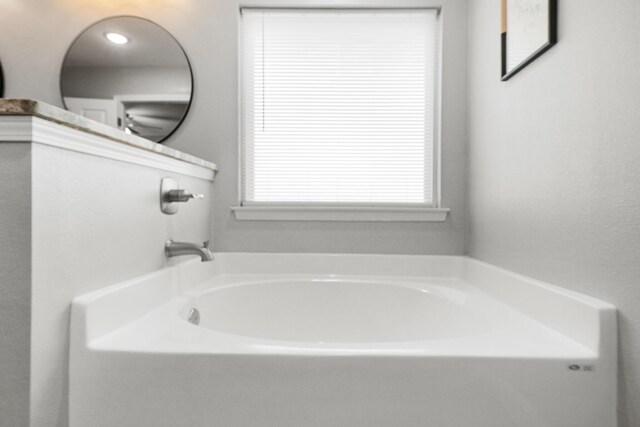 full bath featuring a garden tub