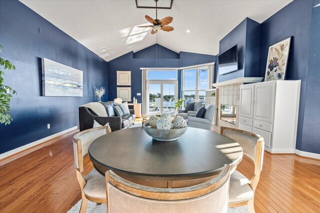 1280 Mahogany Mill Rd, Pensacola, FL 32507 - dining room featuring ceiling fan, vaulted ceiling, light wood-type flooring, and baseboards