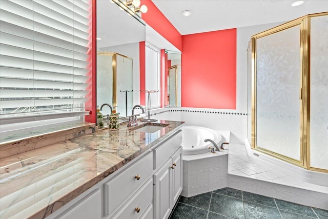 1280 Mahogany Mill Rd, Pensacola, FL 32507 - bathroom featuring a stall shower, a whirlpool tub, tile patterned flooring, and vanity