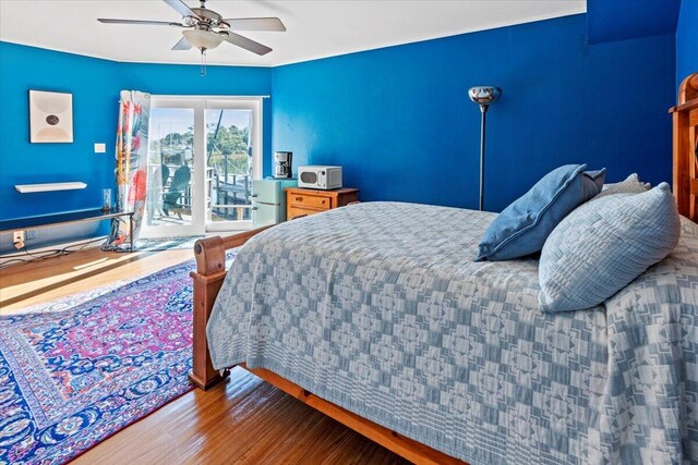 1280 Mahogany Mill Rd, Pensacola, FL 32507 - bedroom with wood finished floors, access to exterior, and ceiling fan