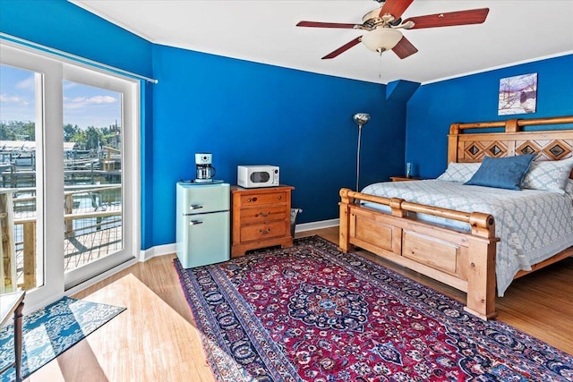 1280 Mahogany Mill Rd, Pensacola, FL 32507 - bedroom featuring wood finished floors, a ceiling fan, and baseboards
