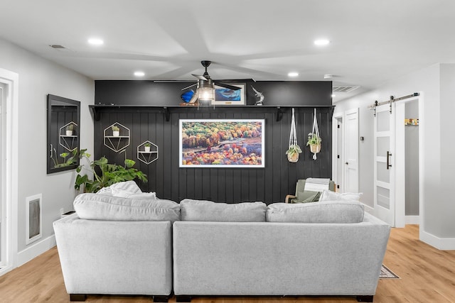 236 Little Canal Dr, Santa Rosa Beach, FL 32459 - living area featuring a barn door, ceiling fan, recessed lighting, and light wood finished floors