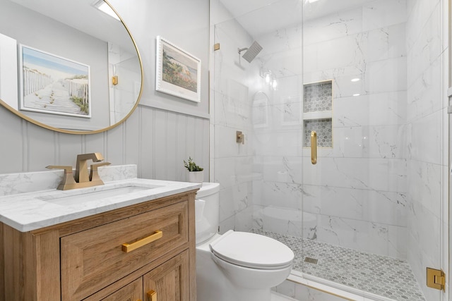 236 Little Canal Dr, Santa Rosa Beach, FL 32459 - full bathroom with a marble finish shower, vanity, and a decorative wall