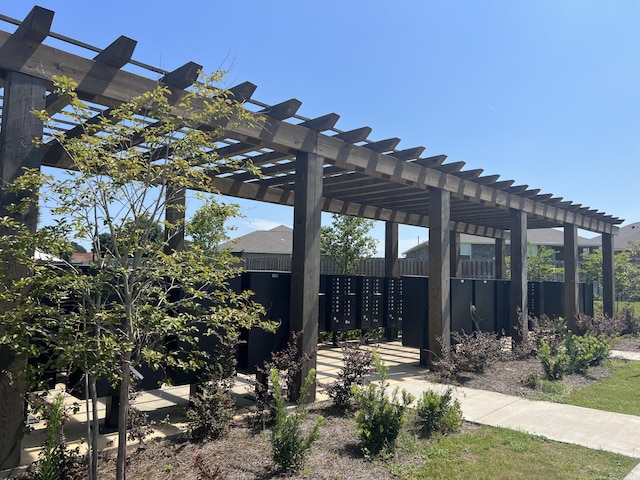 view of yard featuring mail area and a pergola