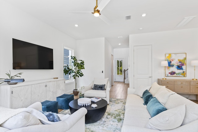 living room featuring ceiling fan, wood finished floors, and recessed lighting