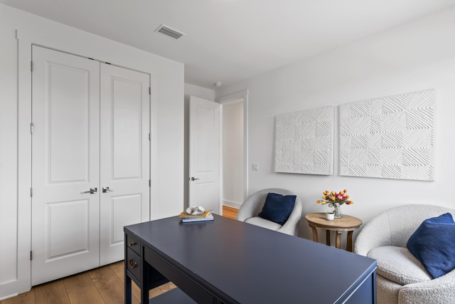 office area with wood finished floors