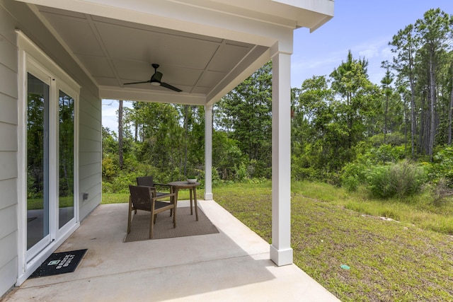 view of patio featuring a ceiling fan
