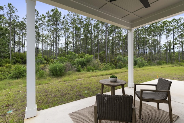 view of patio featuring a ceiling fan