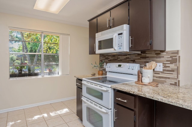 37 James Dr, Shalimar, FL 32579 - kitchen with white appliances, tasteful backsplash, baseboards, dark brown cabinets, and light tile patterned floors