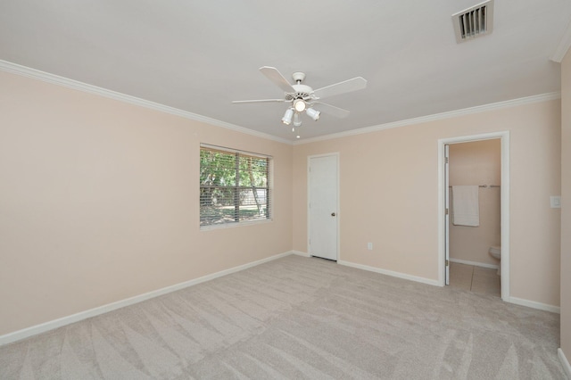 37 James Dr, Shalimar, FL 32579 - unfurnished bedroom featuring crown molding, baseboards, carpet flooring, ensuite bathroom, and ceiling fan
