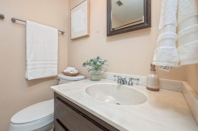 37 James Dr, Shalimar, FL 32579 - bathroom with toilet and vanity