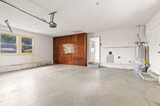 4360 Beau Terra Ln, Pensacola, FL 32514 - garage with water heater and a garage door opener