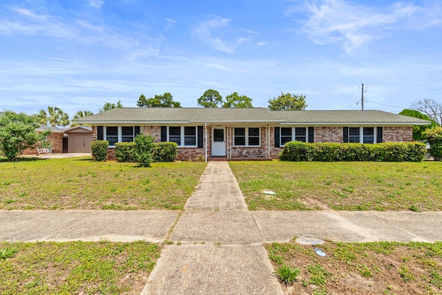 4360 Beau Terra Ln, Pensacola, FL 32514 - ranch-style house featuring brick siding and a front yard