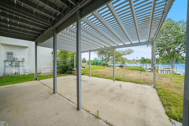 7118 Singleton Cir Unit A, Panama City, FL 32404 - view of patio with a water view and a pergola